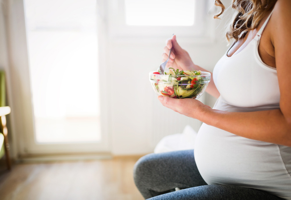 Pregnant Woman Eating Healthy Food